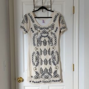 Ivory dress with beaded and embroidered detail. Never worn. Purchased at Frances